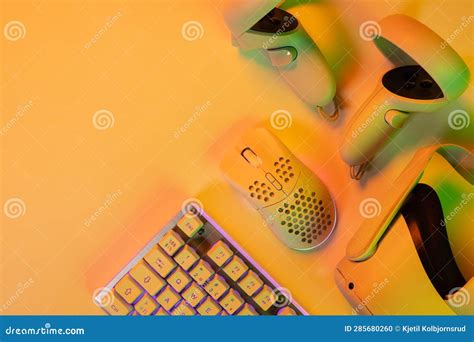 Gaming Accessories and Keyboard on Orange Desk Stock Photo - Image of goggles, professional ...