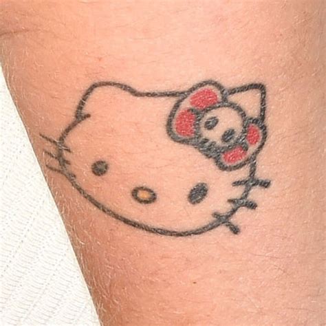 Tattoo Hello Kitty - One Of My Many Hello Kitty Tattoos Hellokitty - It is sitting on a broom ...