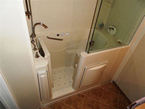 Escape Plus Walk in Tub with 3-wall composite surround, extension, and sliding top-hung clear ...