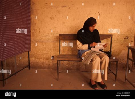 Female election workers wait for the polls to open in Kabul, Afghanistan, October 2004 Stock ...