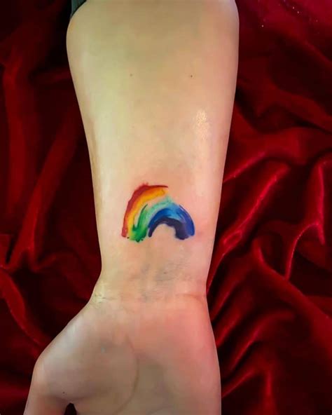 Details more than 57 rainbow bridge tattoo best - in.cdgdbentre