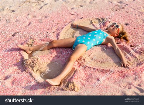 Little Girl Making Sand Angel On库存照片366793007 | Shutterstock