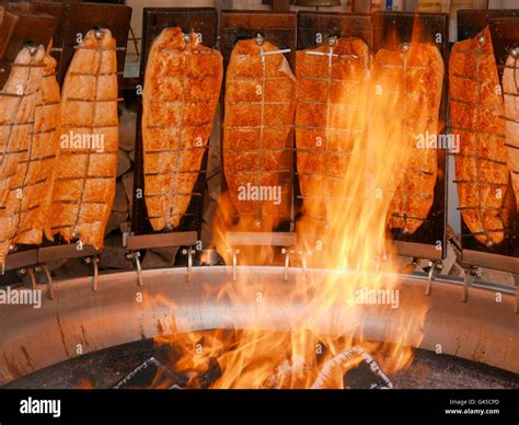 Fish roasting hi-res stock photography and images - Alamy