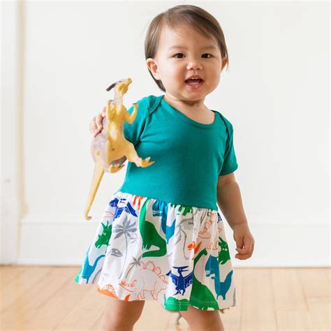 "Mesozoic Mischief" Dinosaurs Snapsuit Dress | Affordable baby girl clothes, Dinosaur outfit ...