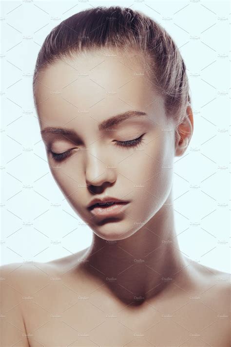 Front portrait of beautiful face with beautiful closed eyes - isolated on white by Buyanskyy on ...