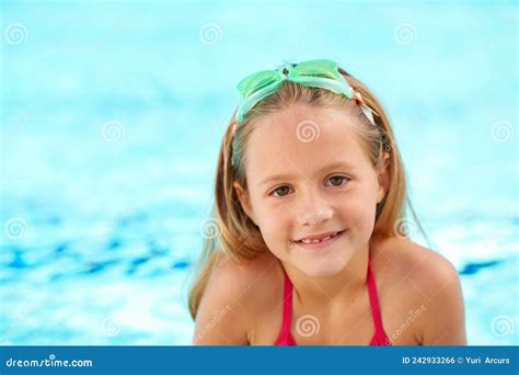 Shes a Summer Child. a Little Girl in the Swimming Pool. Stock Photo ...