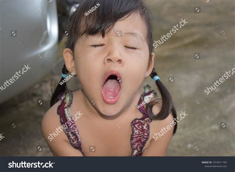 Little Girl Yawning