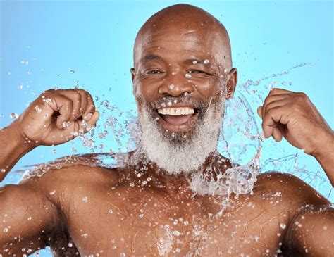 Black Man, Water Splash and Flossing Teeth for Dental Health, Hygiene and Wellness on Blue ...