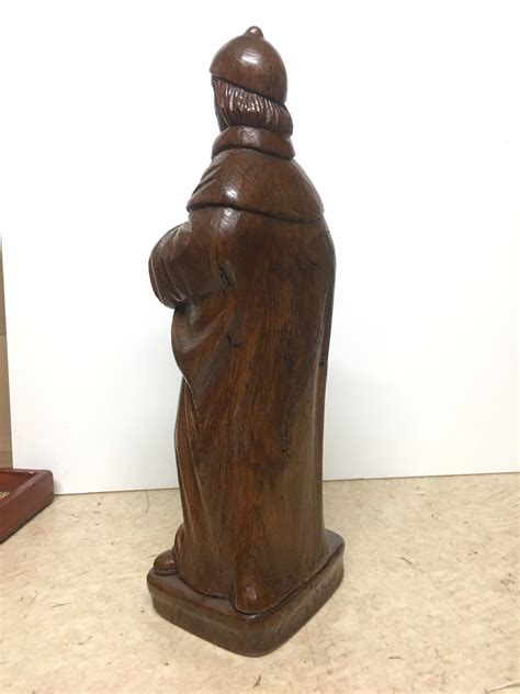 Statue Saint Damien in dark wood