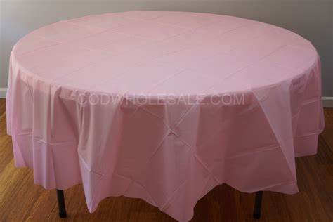 Large 96" round plastic tablecloth in pink