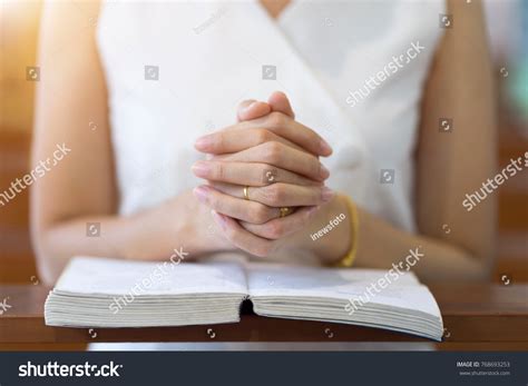 Woman Hands Praying On Holy Bible Stock Photo 768693253 | Shutterstock