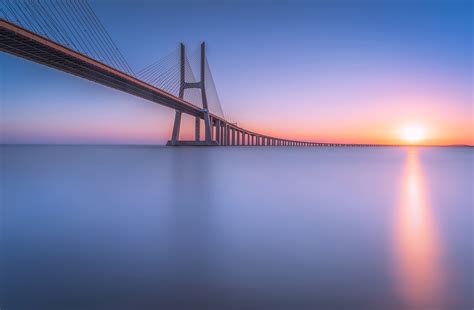 Download Tagus River Lisbon Portugal River Bridge Man Made Vasco Da Gama Bridge HD Wallpaper