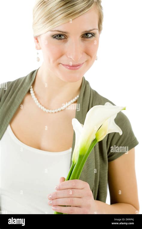 Romantic woman hold calla lily flower purity Stock Photo - Alamy