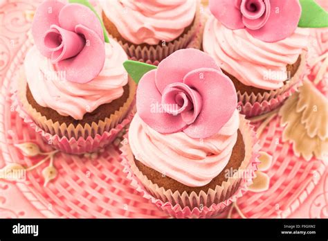 Vintage cupcakes an antique tray Stock Photo - Alamy