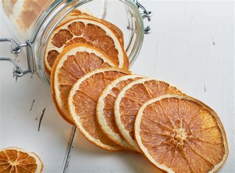 Premium Photo | Healthy snack orange chips on white background