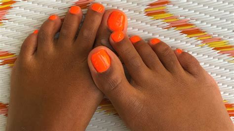 Bright Orange: The Summer Pedicure Trend Bringing Out Warm Tones In ...