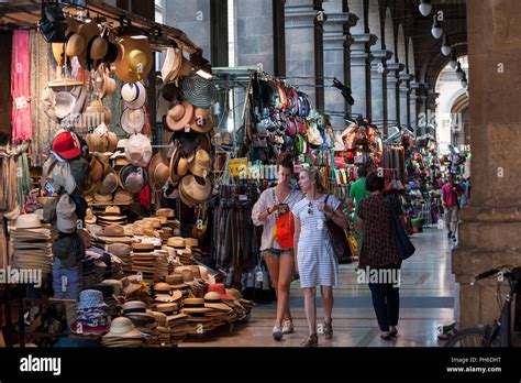 Florence, Italy - 2018, July 14: People shopping at the market stall ...