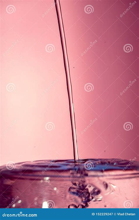 Water Splash Isolated on Red Background Stock Image - Image of colors ...