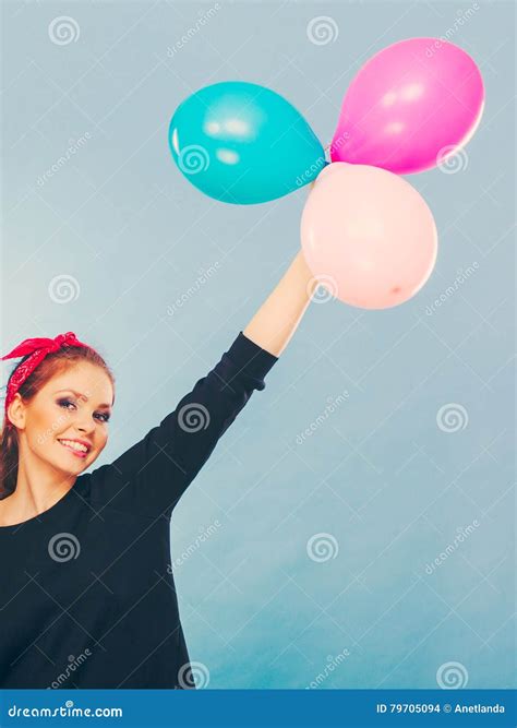 Lovely Smiling Girl Holds Colorful Balloons. Stock Photo - Image of ...