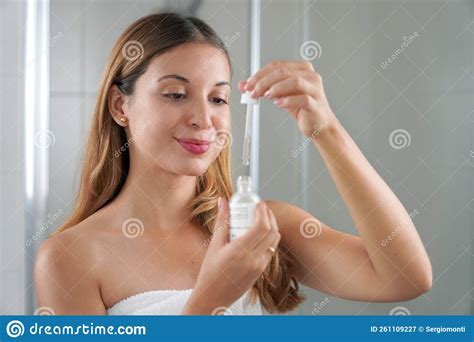 Skincare Beauty Routine At Home. Beautiful Woman Holds Pipette With ...