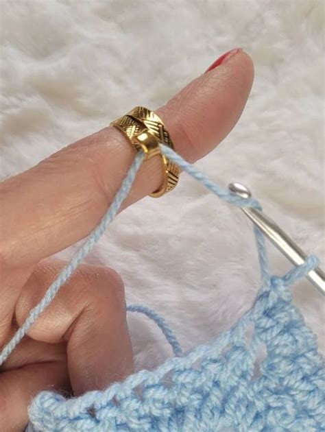 Worked Gold-colored Crochet or Knitting Ring, a Yarn Tension Aid for Crocheting and Knitting ...