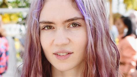 The True Meaning Behind Grimes' Intensely Revealing New Music Video