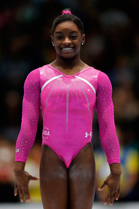 Behold, Simone Biles' Oh-So-Sparkly Leotard Game | Essence