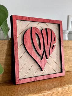This Valentine's Day Love sign is a perfect decoration to celebrate your love. It's laser cut ...