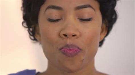 Close up of African American woman blowi... | Stock Video | Pond5