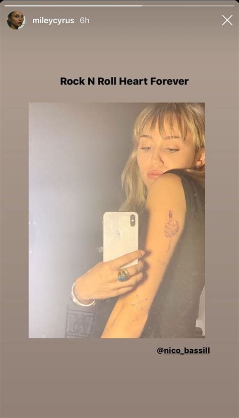 Miley Cyrus’ New Heart Tattoo Meaning Could Be Tied To Cody Simpson | StyleCaster