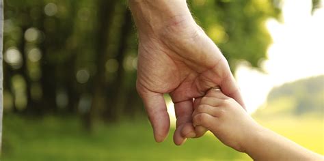 Parent Holds The Hand Of A Small Child - Michael A. Verdicchio