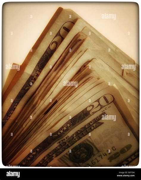 Pile of cash Stock Photo - Alamy