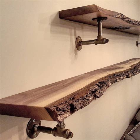 Another shot of the live edge black walnut shelves we made for a repeat client in Toronto. We ...