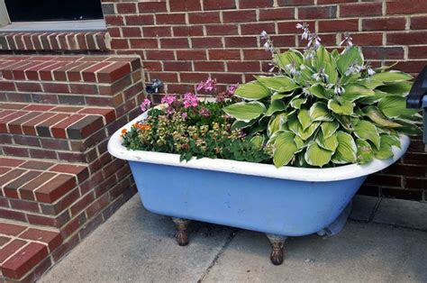 Claw foot bathtub planter | Garden tub, Container garden design, Rustic ...