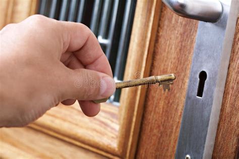 Unlocking a Door with a House Key Stock Photo - Image of unlocking ...