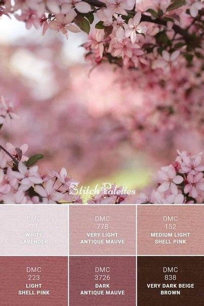 the color palette is shown in shades of pink, brown and white with cherry blossoms on it