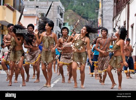 INDIGENOUS PEOPLE DANCE ON STREET OF BANOS ECUADOR Stock Photo - Alamy