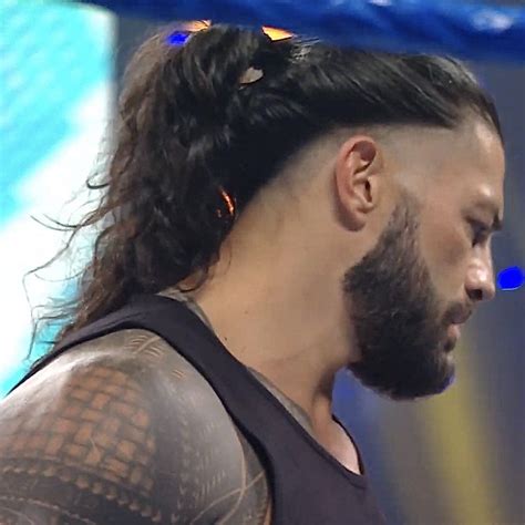 What Kind of haircut does Roman Reigns have?