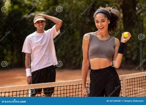 Young People Playing Tennis at the Tennis Court Stock Image - Image of ...