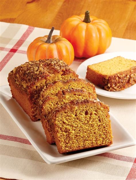 two slices of pumpkin bread on plates
