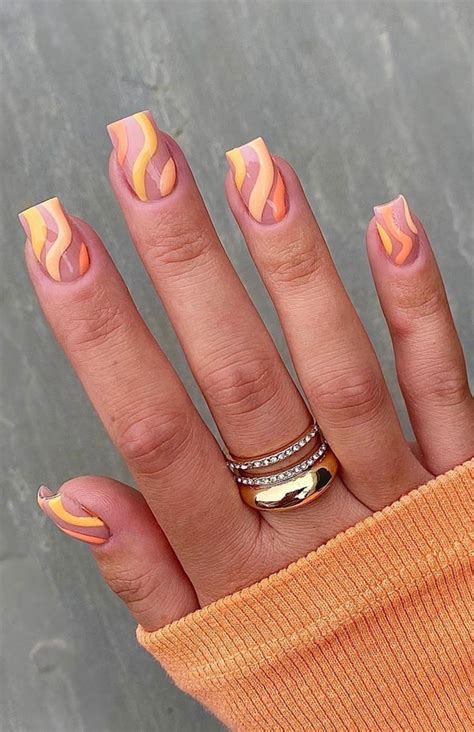 Summer Nail Designs You’ll Probably Want To Wear : Orange swirl nails