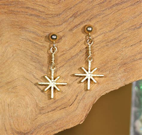 Starburst earrings, celestial earrings, gold star earrings, snowflake earrings, dainty earrings ...