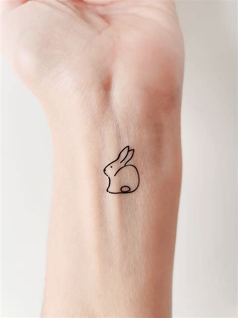 Update more than 77 minimalist bunny tattoo super hot - in.cdgdbentre