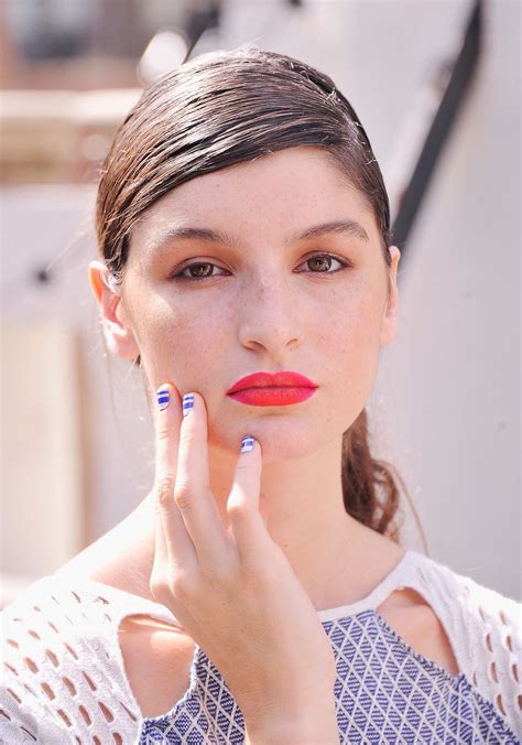 The bold blue-and-white-striped nail wraps were designed by Ann Yee and created by Inni to ...