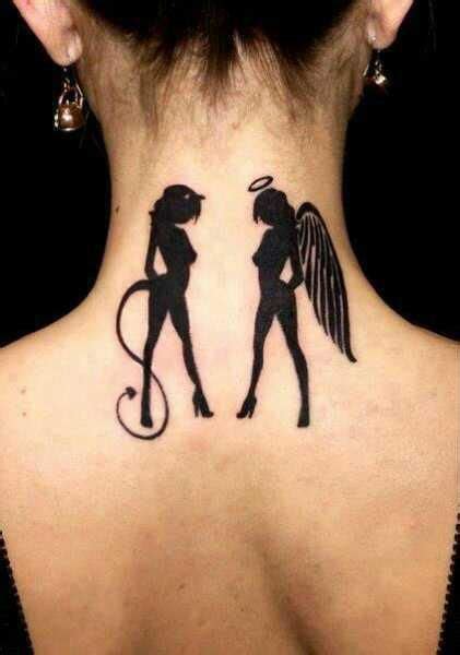 the back of a woman's neck with an angel and demon tattoo on it