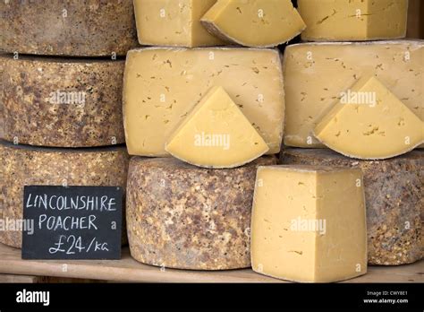 Lincolnshire Poacher cheese for sale at a food fair Stock Photo - Alamy