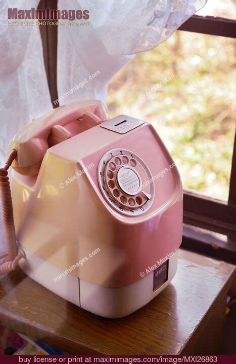 Pink vintage telephone. Stock Photo MXI26863