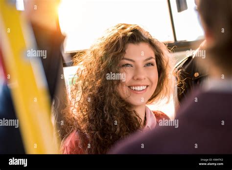 smiling girl in city bus Stock Photo - Alamy