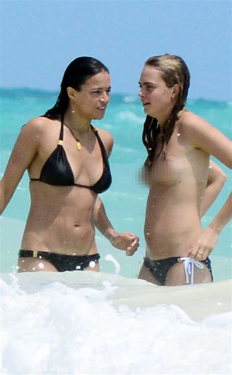 Oops! Cara Delevingne Loses Her Bikini Top!