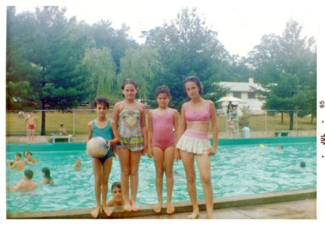 Girls Pose at Swimming Pool, 1965 | Four girls. Boy in pool … | Flickr